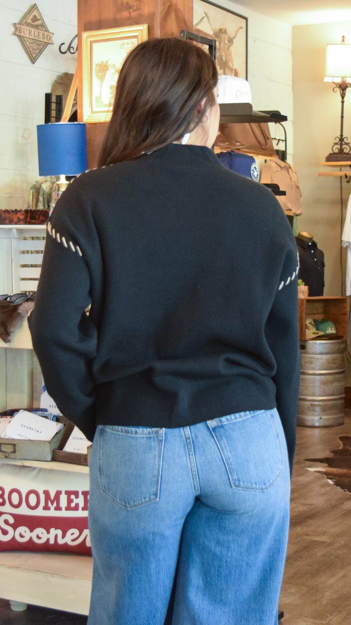 Black sweater with stitch detailing