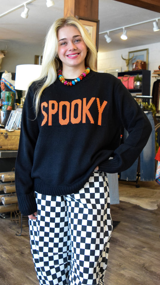 Black and orange "SPOOKY" knit sweater