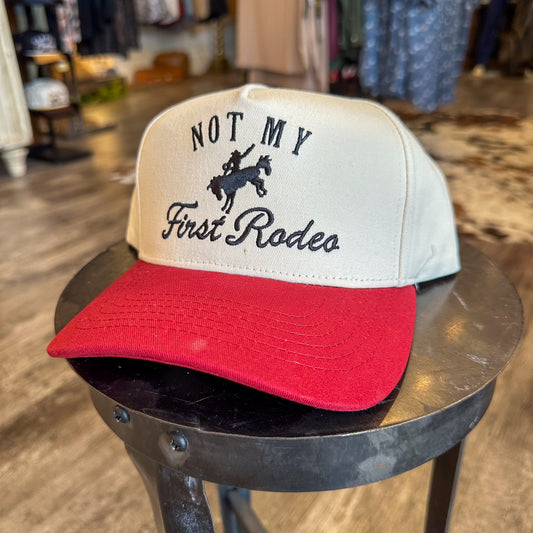 Cream & Red “NOT MY FIRST RODEO” Trucker Hat